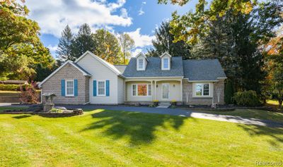 1207 W Dawson Road, Home with 4 bedrooms, 2 bathrooms and null parking in Milford Twp MI | Image 1