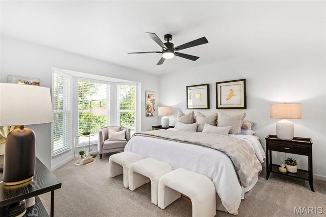 Bedroom with carpet, baseboards, and ceiling fan | Image 19