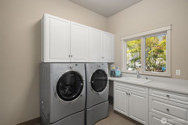 Main floor utility room. It has a great closet in this room so it is as hardworking as it is pretty! | Image 18