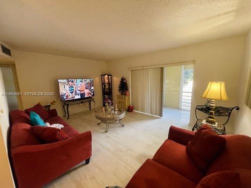 235-5180 E Sabal Palm Blvd, Tamarac, FL, 33319-2669 | Card Image