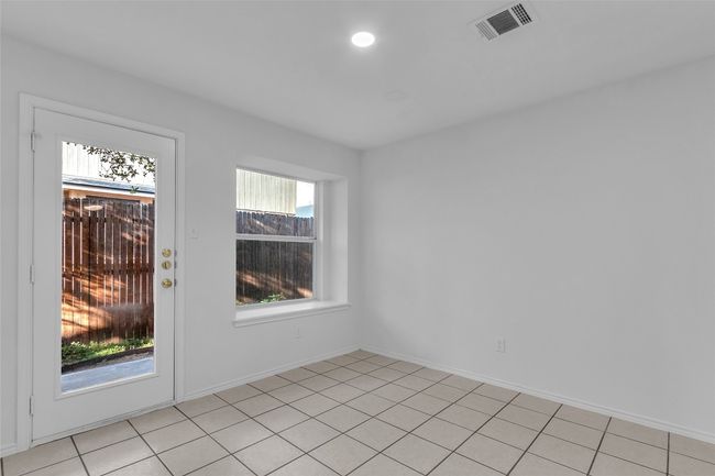 Unfurnished room with light tile patterned floors and recessed lighting | Image 16