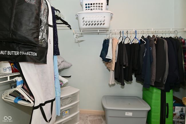 spacious closet with carpet floors | Image 39