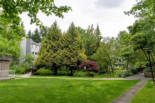 View of home's community with a yard | Image 27