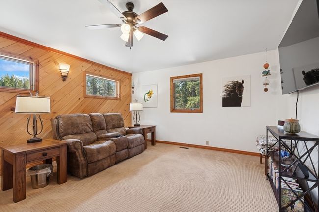 Upper level living room. | Image 59