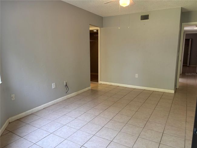 Primary bedroom with view to walk in closet | Image 15