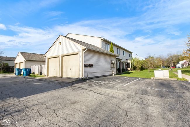 exterior space with uncovered parking and a yard | Image 22