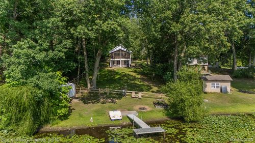 11113 Perch Lake Dr W, Cement City, MI, 49233-9658 | Card Image