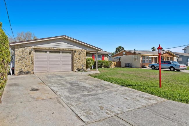 7619 Hatteras Dr, House other with 2 bedrooms, 2 bathrooms and null parking in HUDSON FL | Image 7