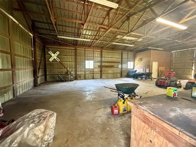 Built in counters and storage in barn/shop | Image 29