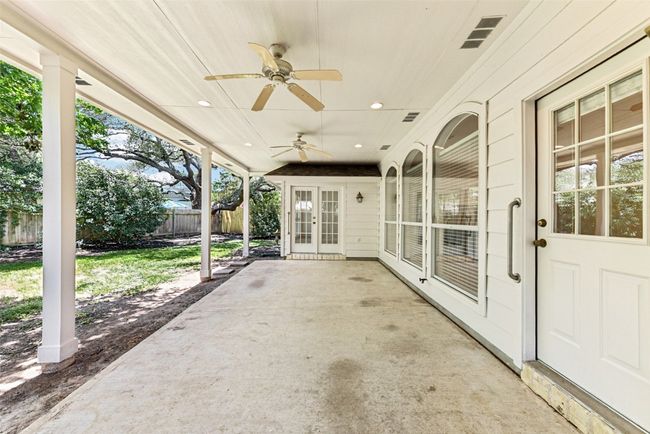 Expansive covered back patio with gas line for barbeques | Image 32