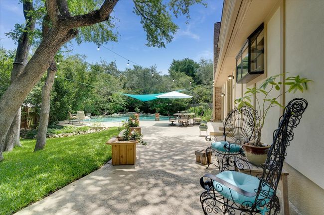 View of patio / terrace with an outdoor pool | Image 6