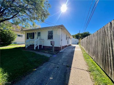 View of front facade with a front yard | Image 2