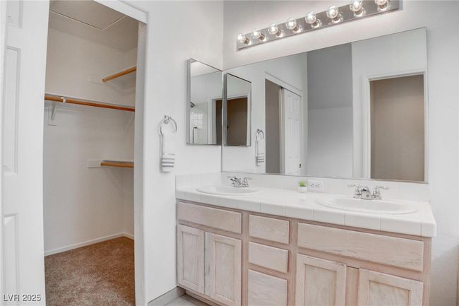 Full bath featuring double vanity, tub / shower combination, and duel sinks | Image 23