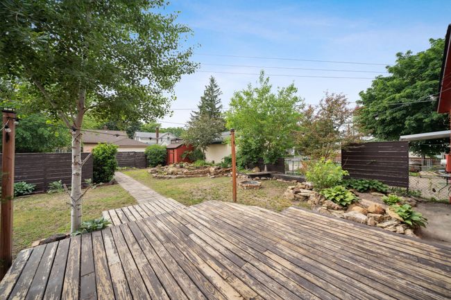 Large deck and entertaining spaces in private backyard (deck will be repaired/painted) | Image 23