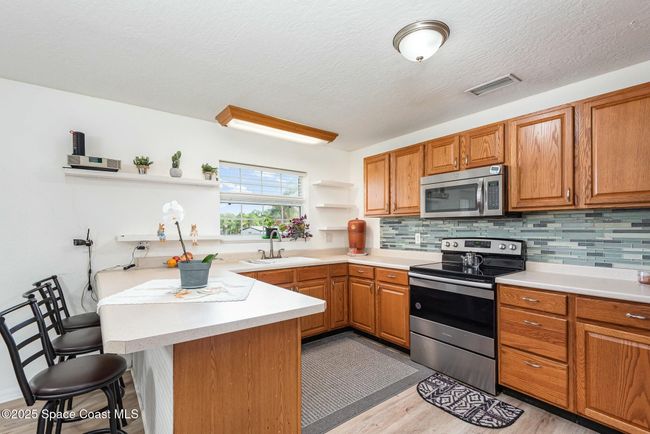 3404 Kilbee St, House other with 3 bedrooms, 2 bathrooms and null parking in Mims FL | Image 11