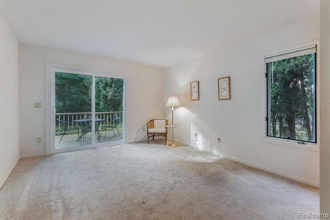 Main Bedroom with Walkout onto Large Back Deck and Private Wooded Backyard | Image 14