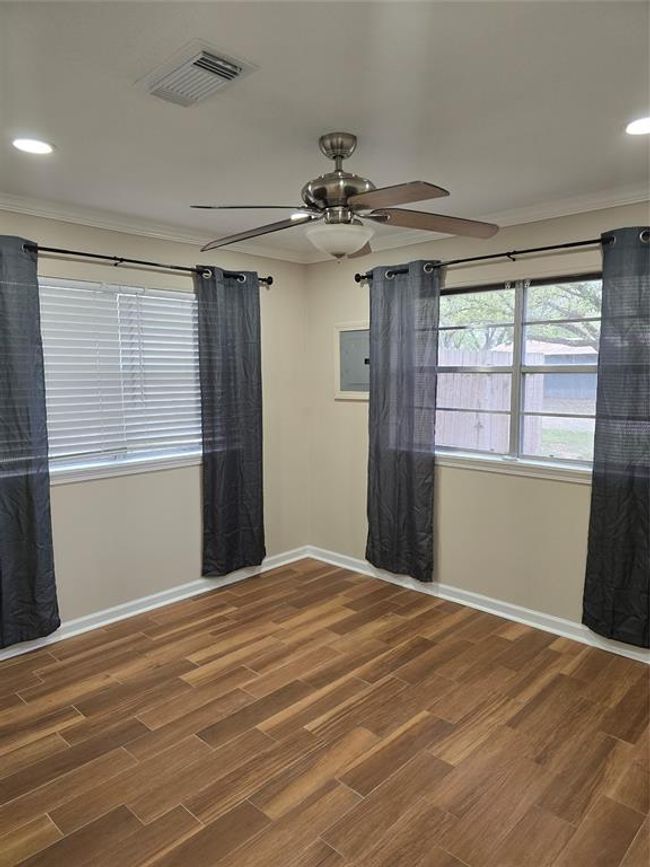 Ready for you to move in. Spacious bedroom with built in closet shelving. | Image 21