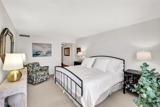 Bedroom with visible vents and carpet floors | Image 21