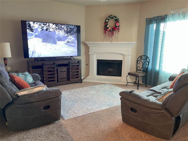 Downstairs Living room with carpet | Image 4