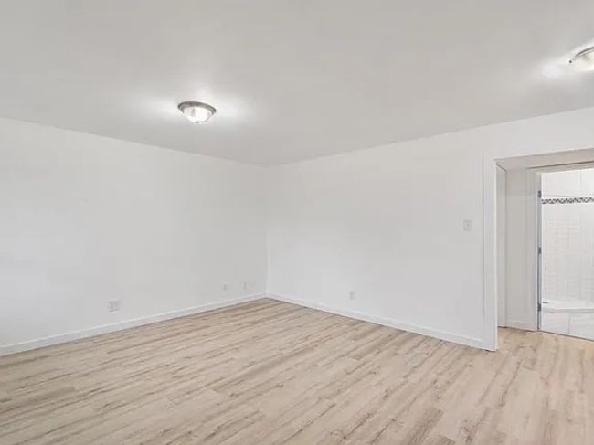Unfurnished room with light wood finished floors and baseboards | Image 16