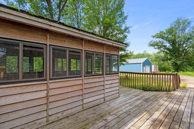 Large screen porch with plexiglass windows has electric. | Image 4