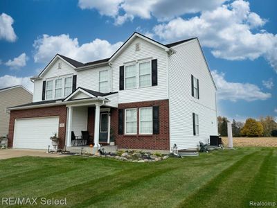 7391 Deer Creek Drive, Home with 4 bedrooms, 2 bathrooms and null parking in Clayton Twp MI | Image 2