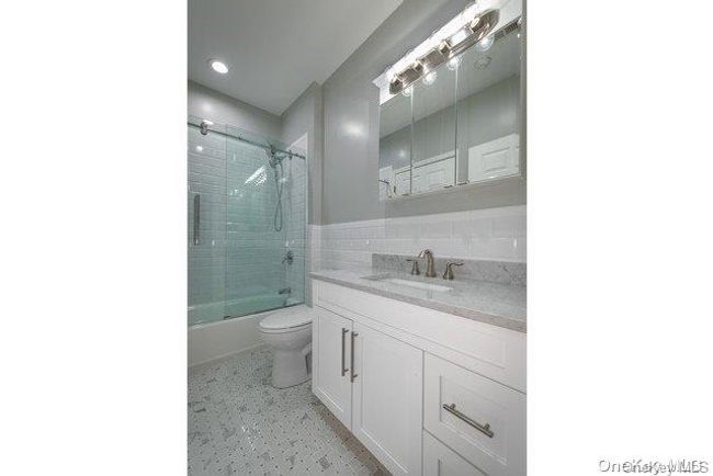 2-228 - 1 Charles Pond Dr, Condo with 2 bedrooms, 2 bathrooms and null parking in Coram NY | Image 9