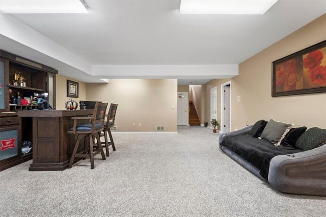 basement room with ensuite full bathroom | Image 36