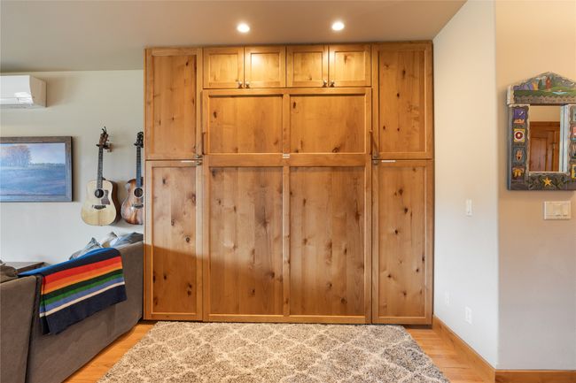 Built-in hydraulic Murphy Bed with side cabinets. | Image 6
