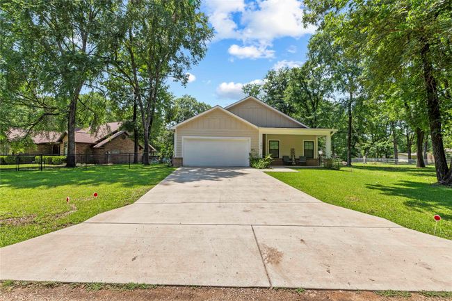 Oversized driveway offers plenty of space for multiple vehicles, guests. | Image 19