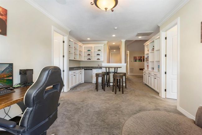Inviting Loft Space with Built-In Storage | Image 31