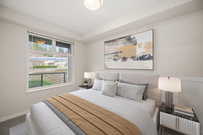 Carpeted bedroom featuring baseboards | Image 5
