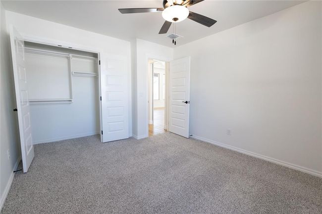 Doorway to outside featuring baseboards and wood finished floors | Image 19