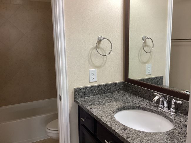 Full bath featuring vanity and toilet | Image 28