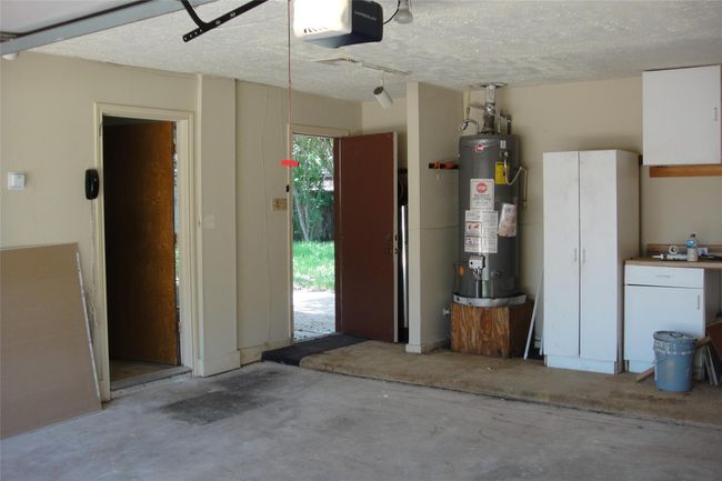 Garage has separate zoned hvac and exit door. | Image 12