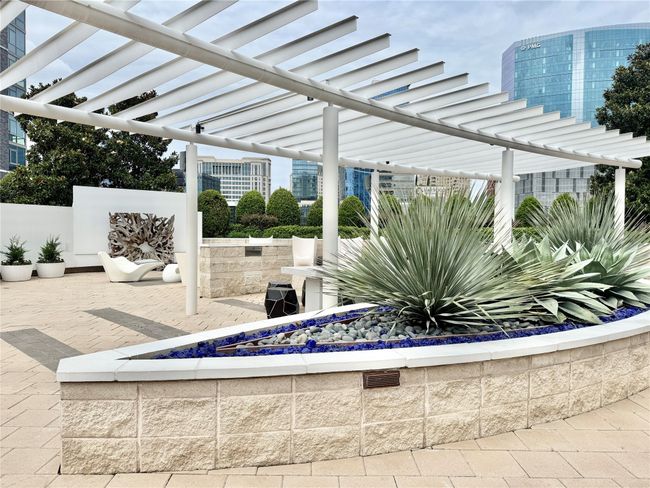 View of patio / terrace featuring an outdoor fire pit and a pergola | Image 29