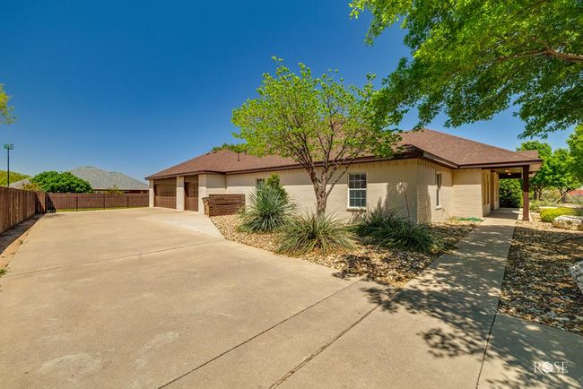 concrete driveway, south view of house | Image 47