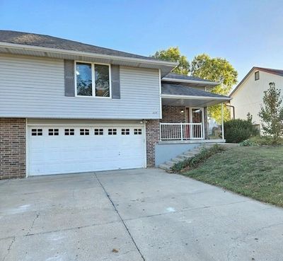 View of front of home with a garage | Image 1