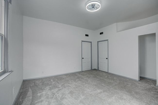 If your family has a need for a third bedroom, here it is. Also has a bath and right next to the laundry. Enjoy your morning coffee on the deck and sip some wine in the evening. | Image 14