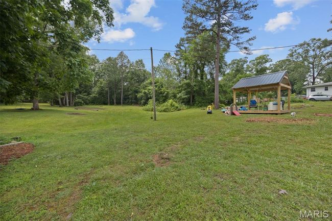 View of grassy yard featuring a gazebo | Image 22