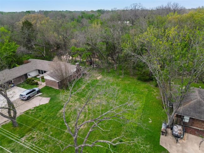 Birds eye view of property featuring a forest view | Image 4