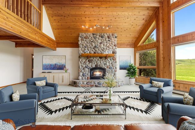 Living area. This image has been virtually staged. | Image 10