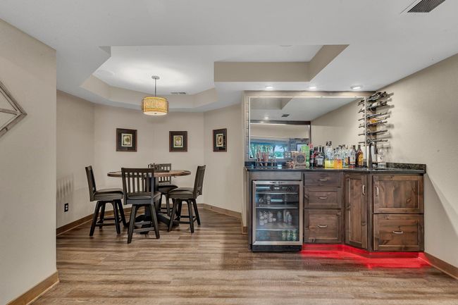 Charming corner space designed for game night fun or quiet evenings in. | Image 26