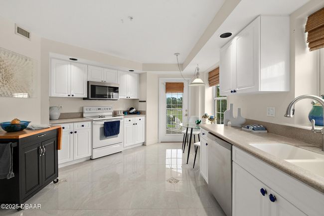 C303 - 4650 Links Village Dr, Condo with 3 bedrooms, 3 bathrooms and null parking in Ponce Inlet FL | Image 13