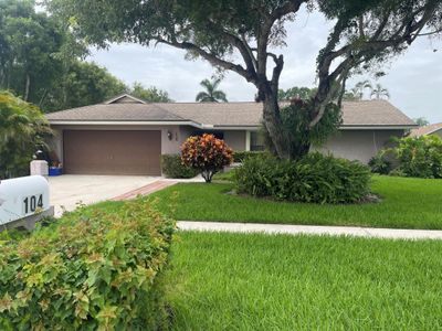 104 Parkwood Drive, House other with 4 bedrooms, 2 bathrooms and null parking in Royal Palm Beach FL | Image 1