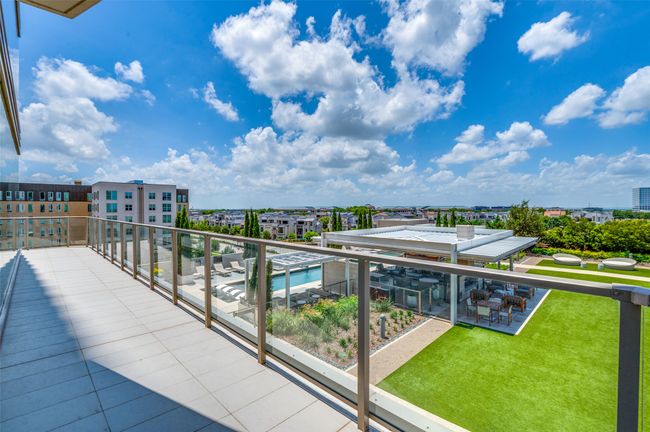 Balcony featuring view of pool area | Image 30