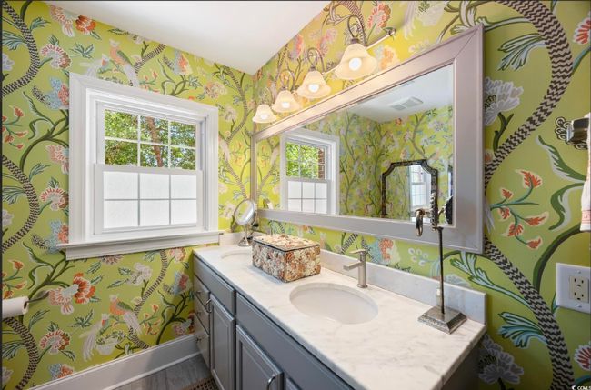 Bathroom with wallpapered walls and double vanity | Image 15