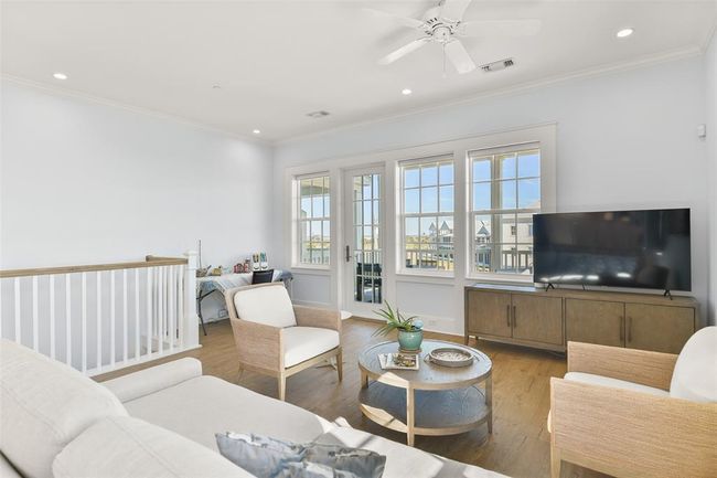 Addition view of living room with porch access. | Image 8
