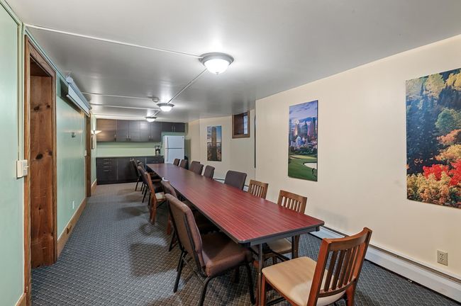 Community room on the lower level. | Image 41