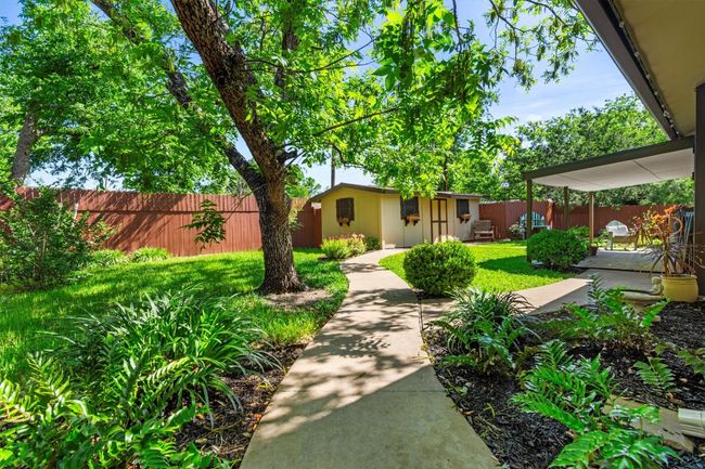 Mature trees provide natural shade and help keep the outdoor space cooler in the summer months. | Image 28